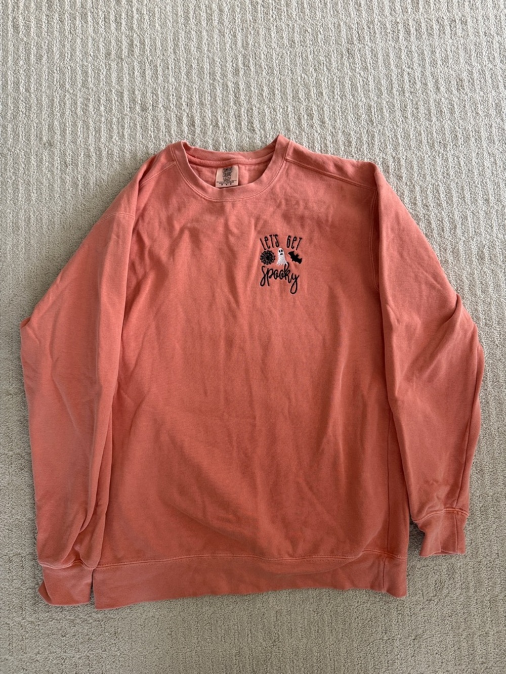 Comfort Colors Coral Crewneck Sweatshirt with 'Let's Get Spooky' Chest Graphic